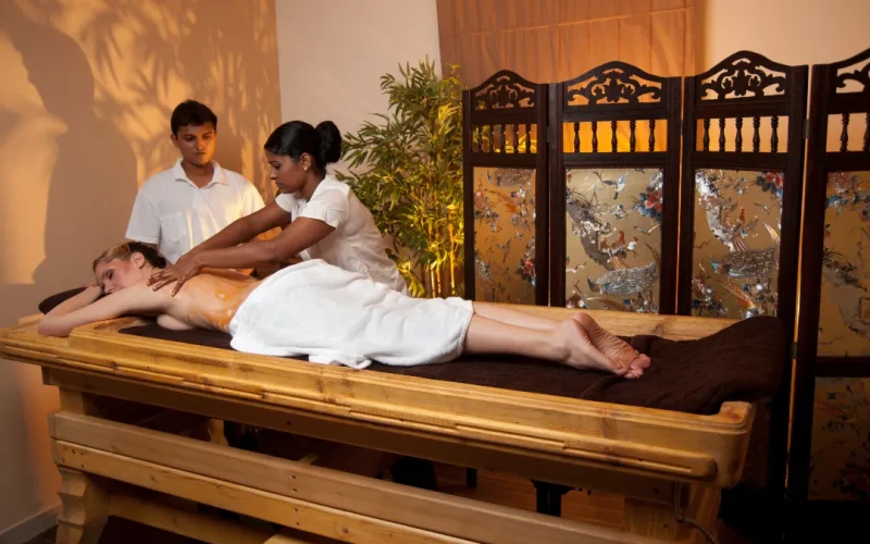 This person is geting Deep Tissue Massage on a portable Massage bed in his apartnent in dubai.