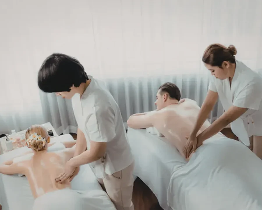 Person receiving a professional massage on a portable massage bed in an apartment in Home Massage in Person receiving a professional massage on a portable massage bed in an apartment in Home Massage in Dubai Media City