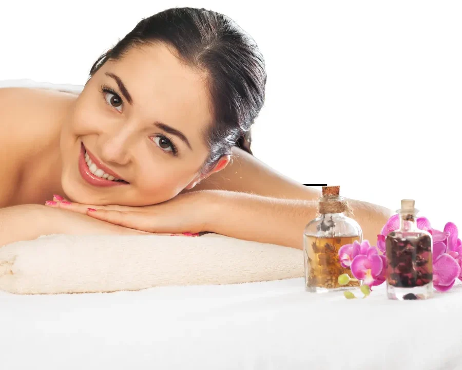 Person receiving a professional massage on a portable massage bed in an apartment in Home Massage in Mirdif