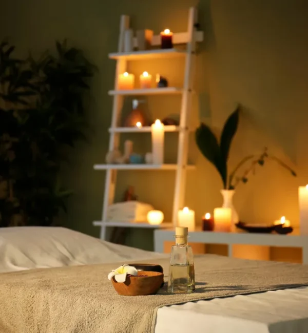 Person receiving a professional massage on a portable massage bed in an apartment in Home Massage in Person receiving a professional massage on a portable massage bed in an apartment in Home Massage in Motor City