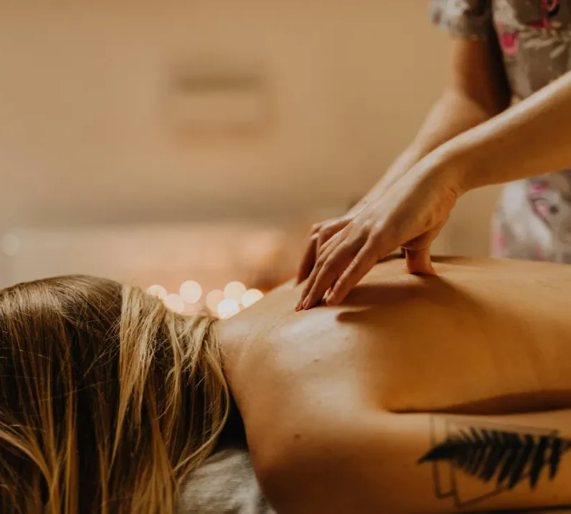 This person is geting Hot Stone Massage on a portable Massage bed in his apartnent in dubai.