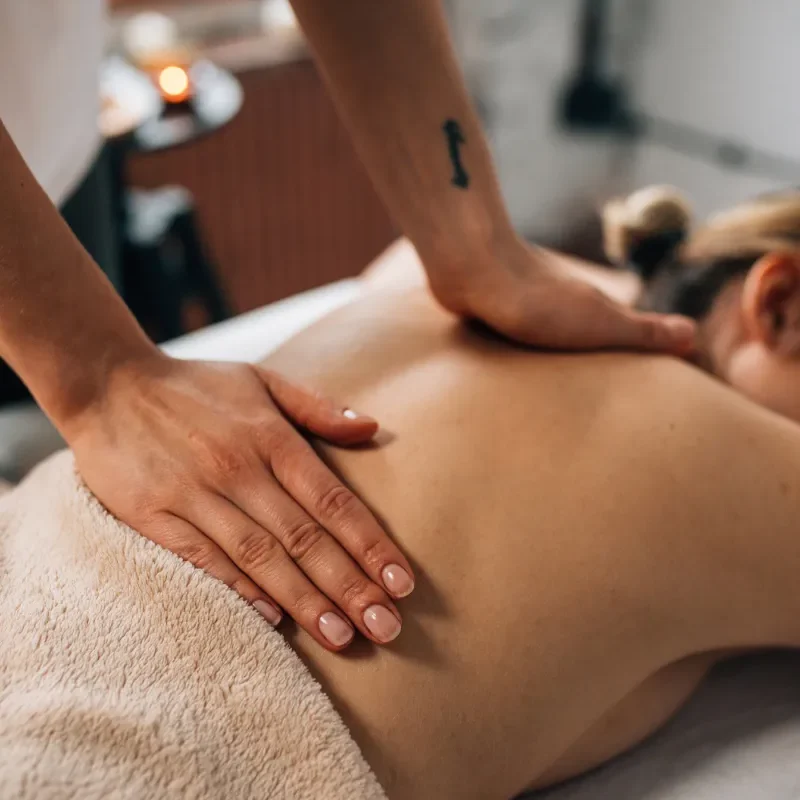 This person is geting Swedish Massage on a portable Massage bed in his apartnent in dubai.