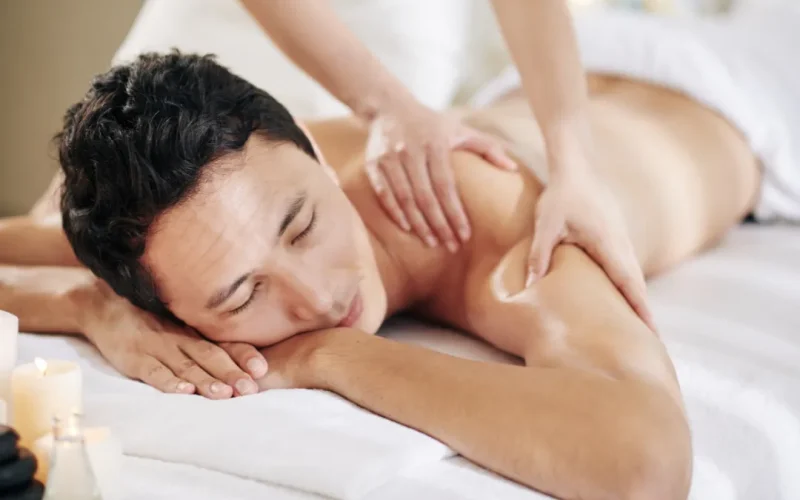 This person is geting Swedish Massage on a portable Massage bed in his apartnent in dubai.